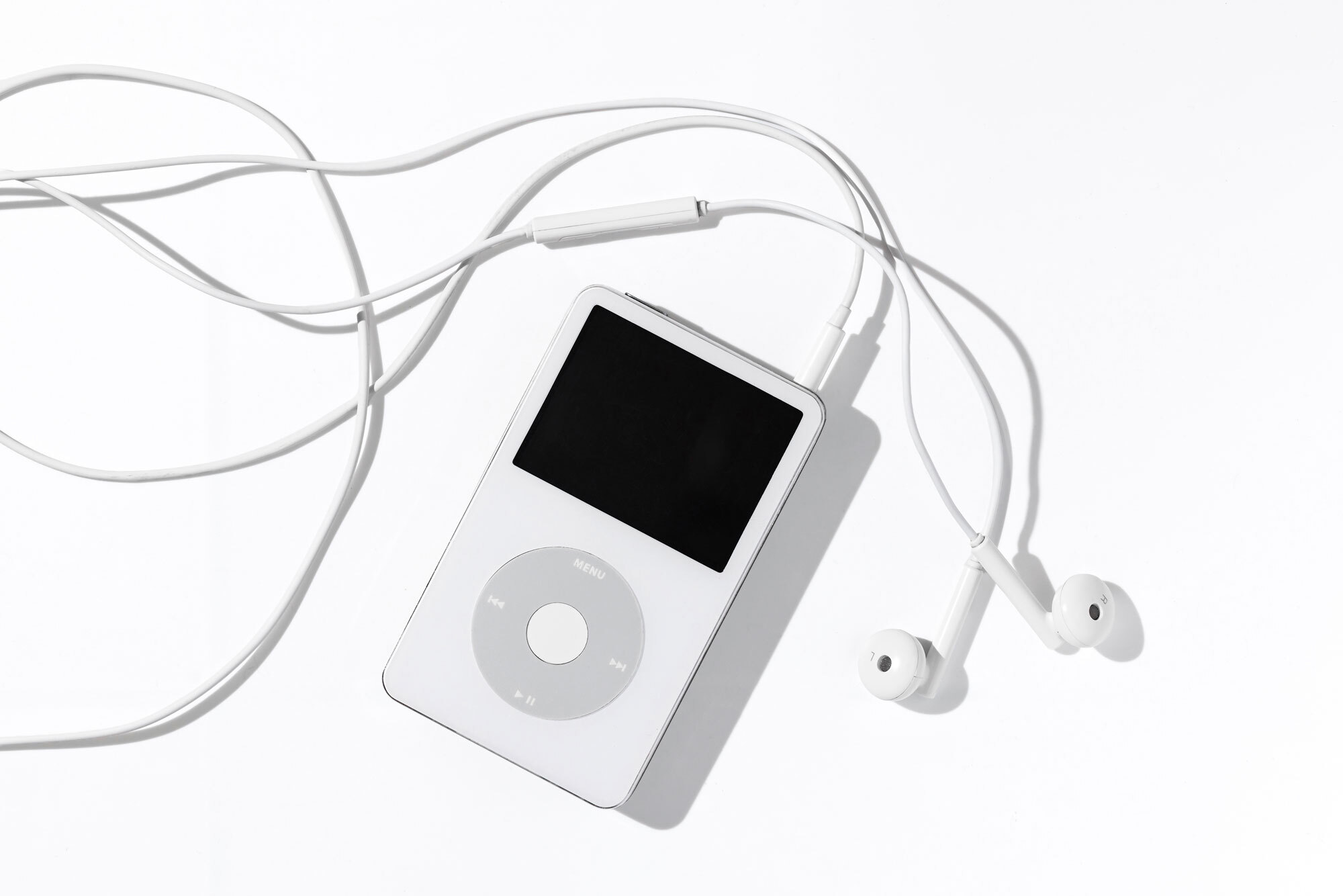 iPod and iTunes remake Apple as a brand