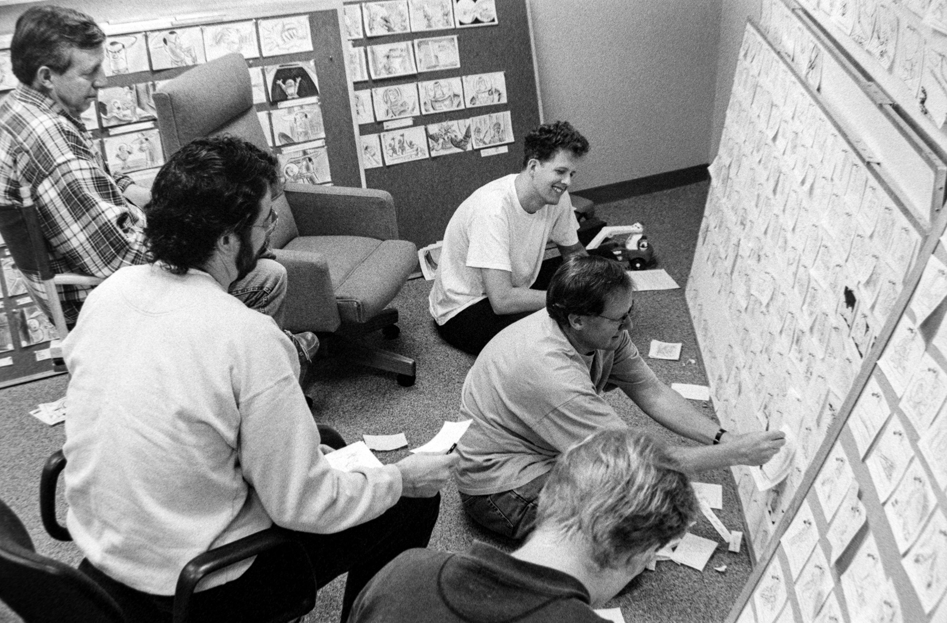 Director Jon Lasseter leads a storyboard meeting. Source: thewaltdisneycompany.com