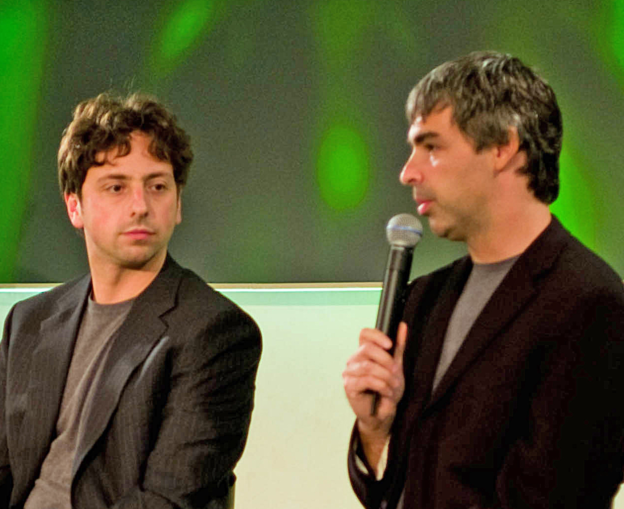 Google co-founders Sergey Brin (L) and Larry Page (R) were summoned out of retirement to discuss Google's response to OpenAI's ChatGPT. Source: By Joi Ito from Inbamura, Japan