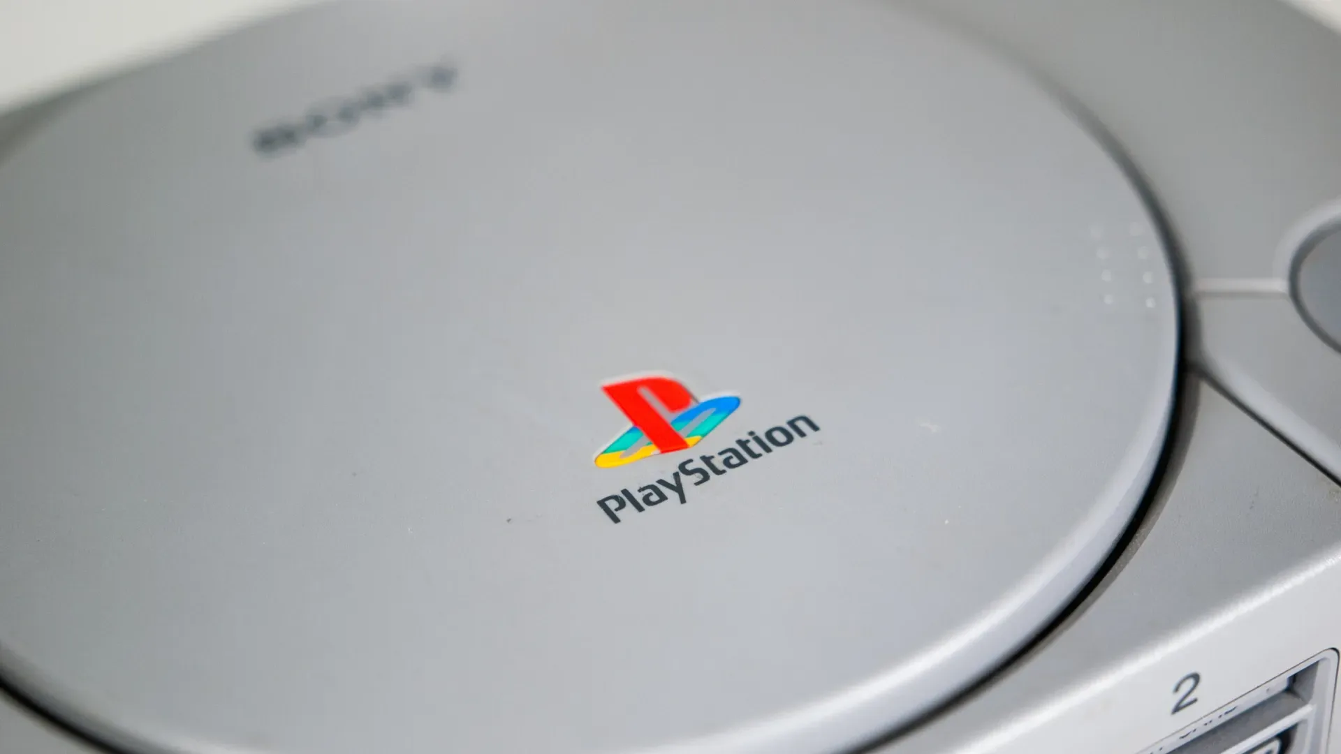 Manabu Sakamoto draws the PlayStation mark and gives Sony a second house